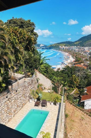 Casa com piscina vista mar